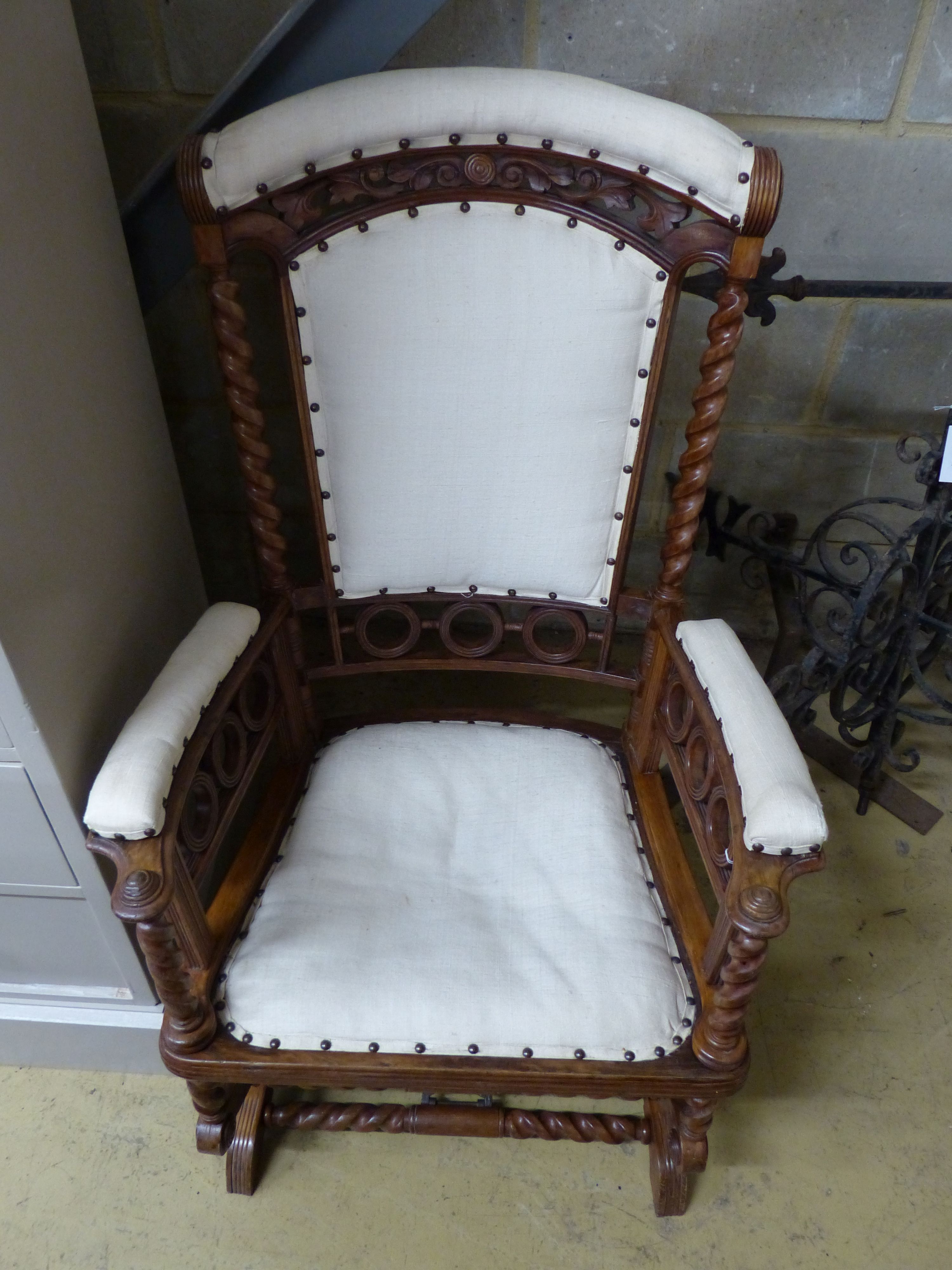 A late 19th century American walnut rocking chair